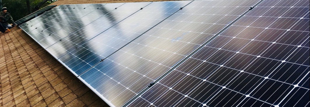 Photo of Solar Panels on a shingle roof, installed by VXA Solar